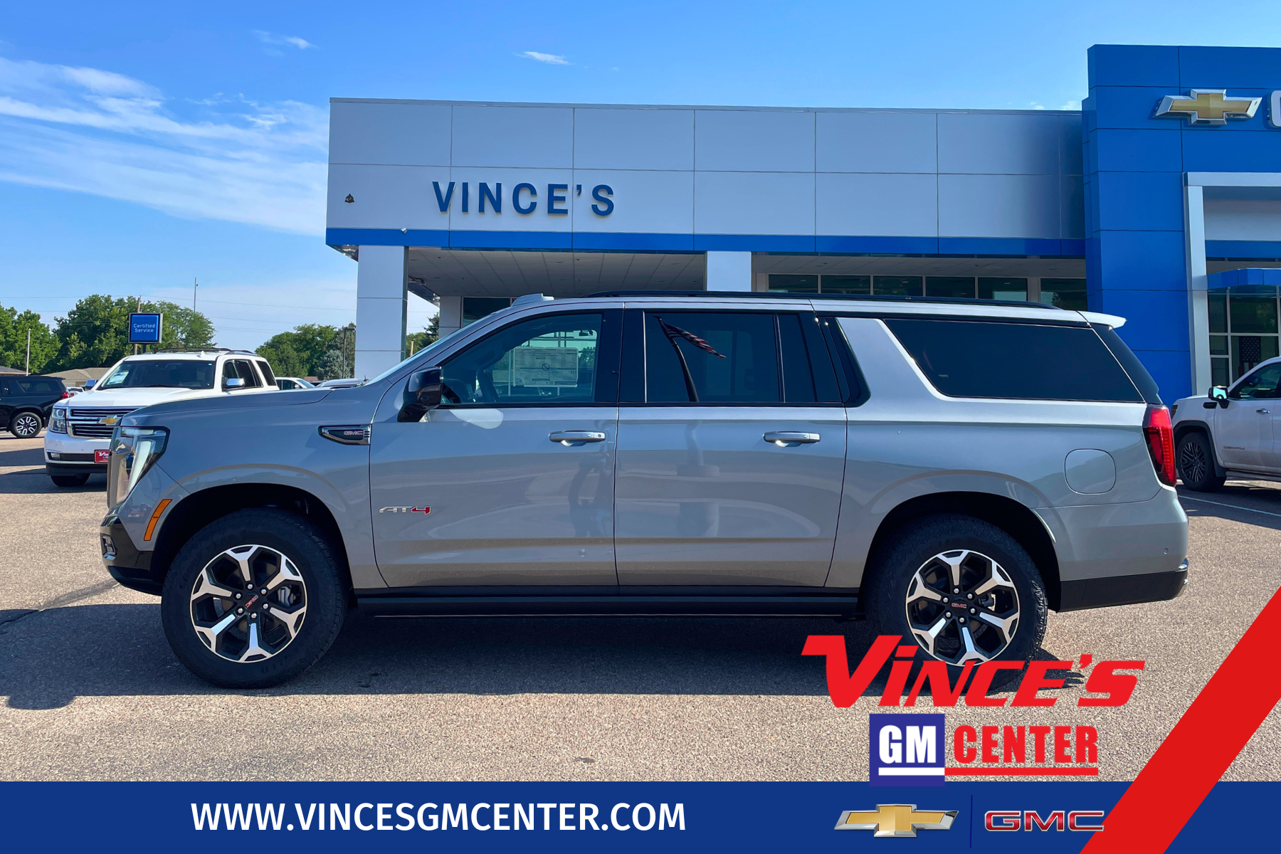 2026 GMC Yukon XL AT4 in Sterling Metallic — front three-quarter view