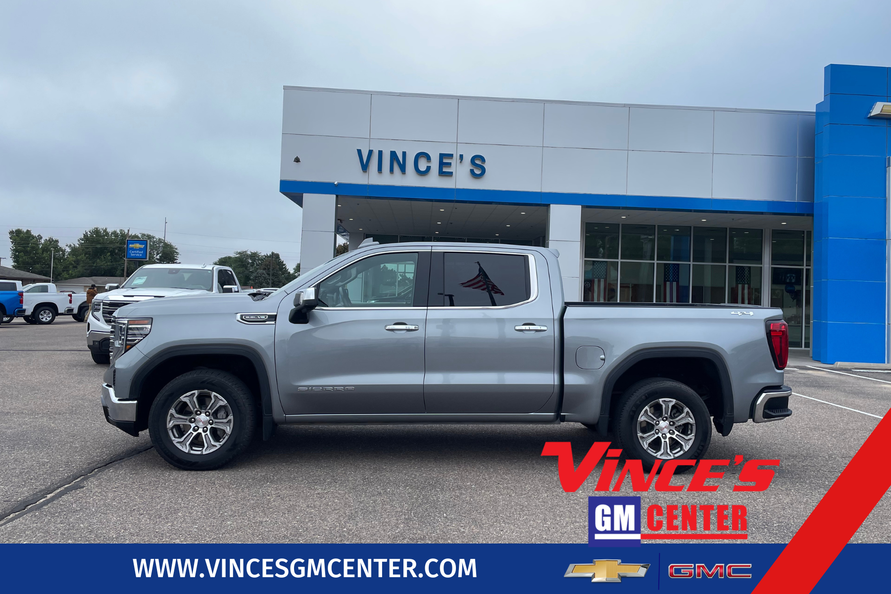 2024 GMC Sierra 1500 SLT in Sterling Metallic — front three-quarter view